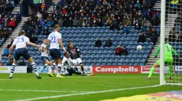 Luke Berry has a dig, evading Darnell Fisher's challenge