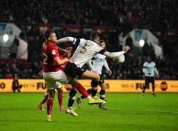 Sonny Bradley battling with Tomas Kalas to try carve out an opening