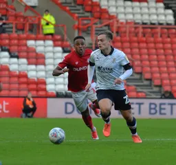 Luke Bolton looking to progress the ball upfield