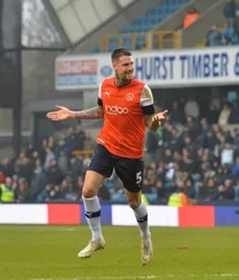 Sonny Bradley celebrates opening the scoring at the New Den