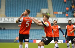 Sonny Bradley shushes the crowd at the New Den