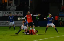 Matty Pearson is taken down in the box Sonny Bradley appeals for a penalty