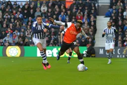 Kazenga LuaLua gets the better of Jake Livermore