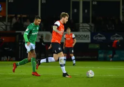 Glen Rea controlling the midfield with Dominic Iorfa in pursuit