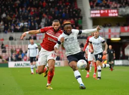 Kazenga LuaLua battles with Harold Moukoudi