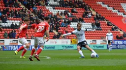 Luke Berry tries his luck from distance, but is getting closed down by Tom Lockyer, Erhun Oztumer and Deji Oshilaja