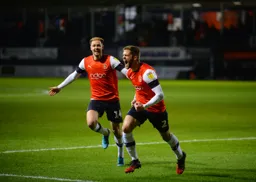 Martin Cranie celebrating after seeing his spectacular effort fly in the goal