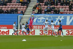 Simon Sluga claims the cross, in what was one of his finest games during his time as a Hatter