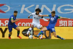 Izzy Brown about to leave Joe Willams behind with a tidy Cruyff turn