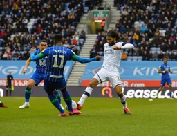 Izzy Brown putting a foot in against Gavin Massey