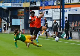 Harry Cornick hurdling a challenge from Tom Barkhuizen