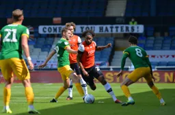 Izzy Brown driving through the middle of the Preston midfield