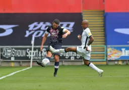 Matty Pearson send a big ball down the channel