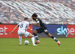 Izzy Brown beating his man in order to put in a wonderful cross leading to the goal