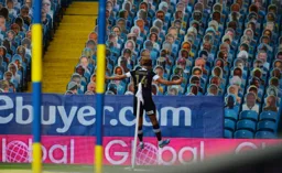 Harry Cornick celebrates in front of the Leeds fans, but they are unmoved