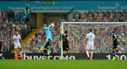 Simon Sluga gathers the cross comfortably