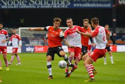 James Collins battles with Mads Andersen and Mike-Steven Bähre