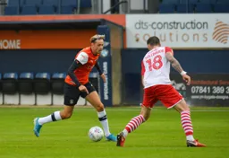 Harry Cornick trying to get through Michael Sollbauer