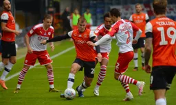 James Bree battling hard to progress the ball