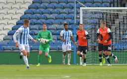 Simon Sluga looks to start a counter attack after gathering the ball