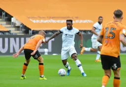 Kazenga LuaLua about to turn Daniel Batty to put in a shot