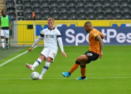 James Bree keeps play ticking over, sending a ball down the line