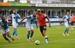 Harry Cornick going around the outide of the Blackburn defence