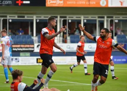 Cameron Carter-Vickers and Sonny Bradley celebrate the equalising goal