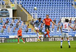 Jordan Clark rises to head in the only goal of the game