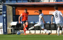 Rhys Norrington-Davies plays the ball inside