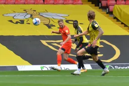 Martin Crainie sends a cross into the danger area