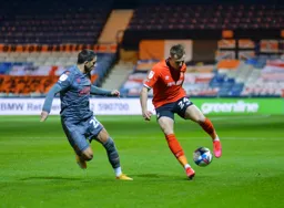 Rhys Norrington-Davies brings the ball under control