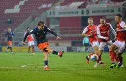 Luke Berry takes a shot at goal