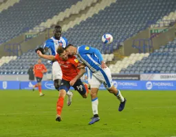 James Collins and Jonathan Hogg go in where it hurts