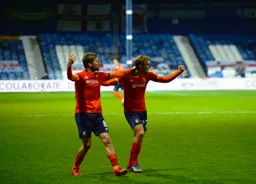 Luke Berry celebrates his goal with Kiernan Dewsbury-Hall