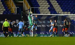 James Shea spills the ball but is challenged illegally