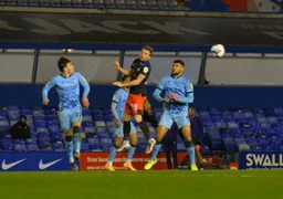 Jordan Clark gets between Callum O`Hare and Maxime Biamou