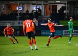 James Collins with his characteristic pose celebrates completing his hat-trick