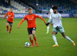 Luke Berry is closed down by Phillip Billing