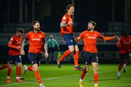 Glen Rea leaps for joy after scoring the first goal
