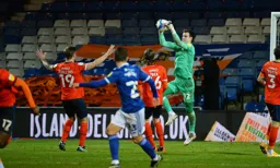 Simon Sluga demonstrates a safe pair of hands