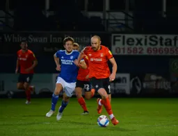 Danny Hylton keeps his eyes on the ball