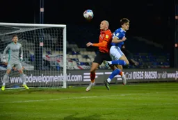 Kal Naismith wins a header