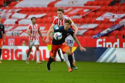 A determinded look on the face of James Collins