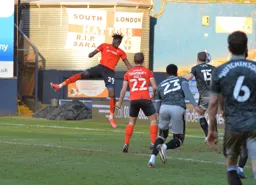 Elijah Adebayo heads in Town`s third goal to complete the comeback