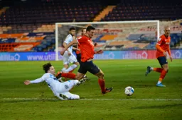 Matt Pearson avoids a sliding tackle