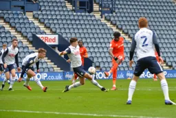 Elijah Adebayo`s shot appears to be charged down