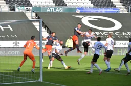Matt Pearson poses a threat to the Derby defence