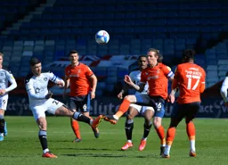 Glenn Rea hits the ball on the volley