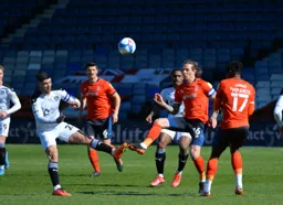 Glenn Rea hits the ball on the volley
